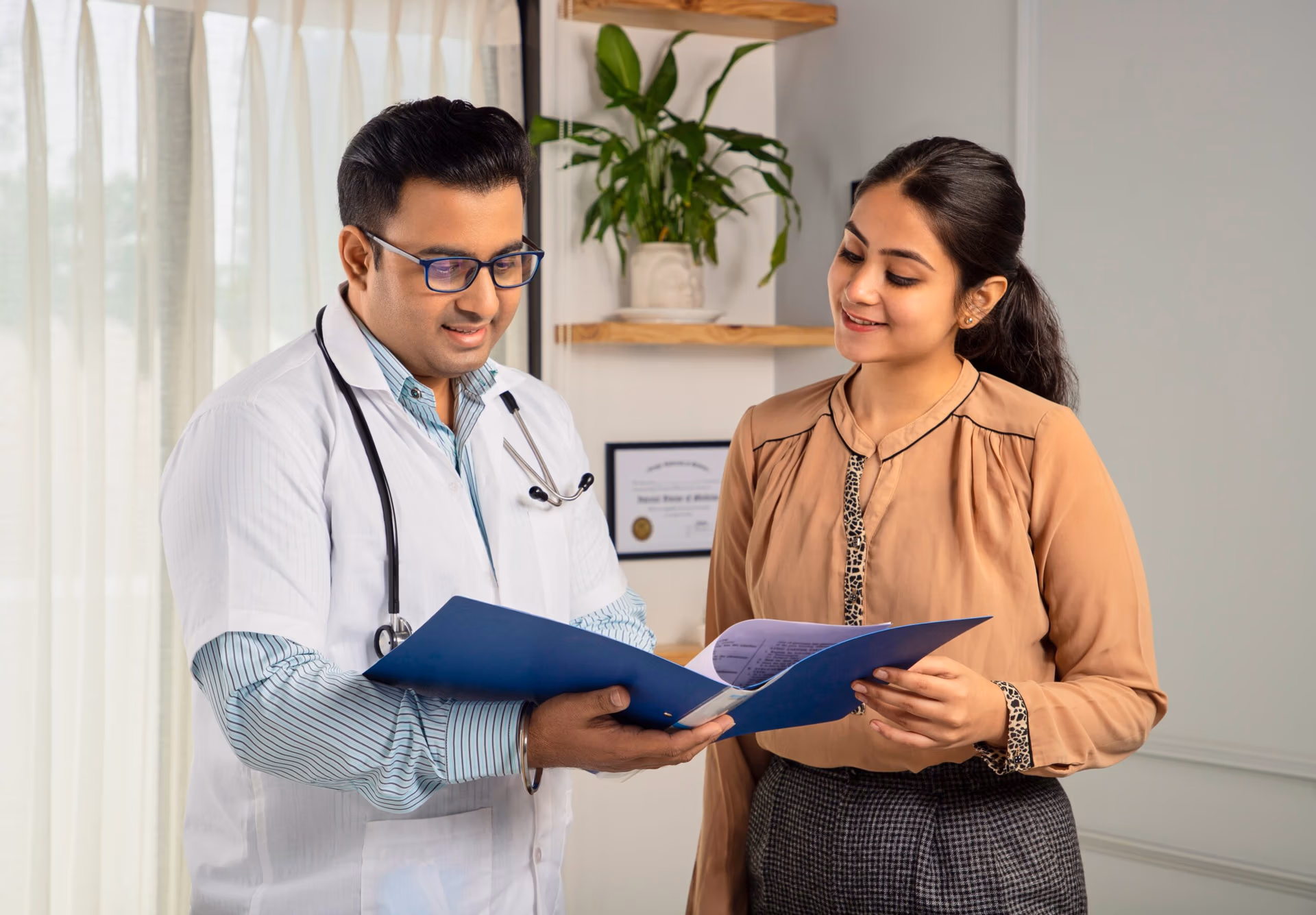 Person reviewing THINNR meal plan with physician at Anara Medspa